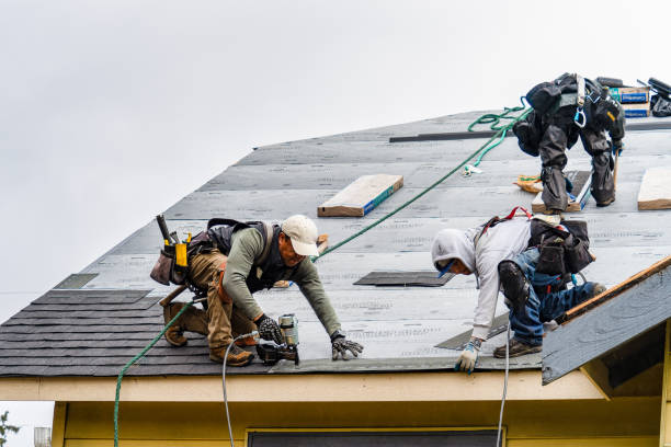 Professional Emergency Roof Repair technician working in Smithville, OH